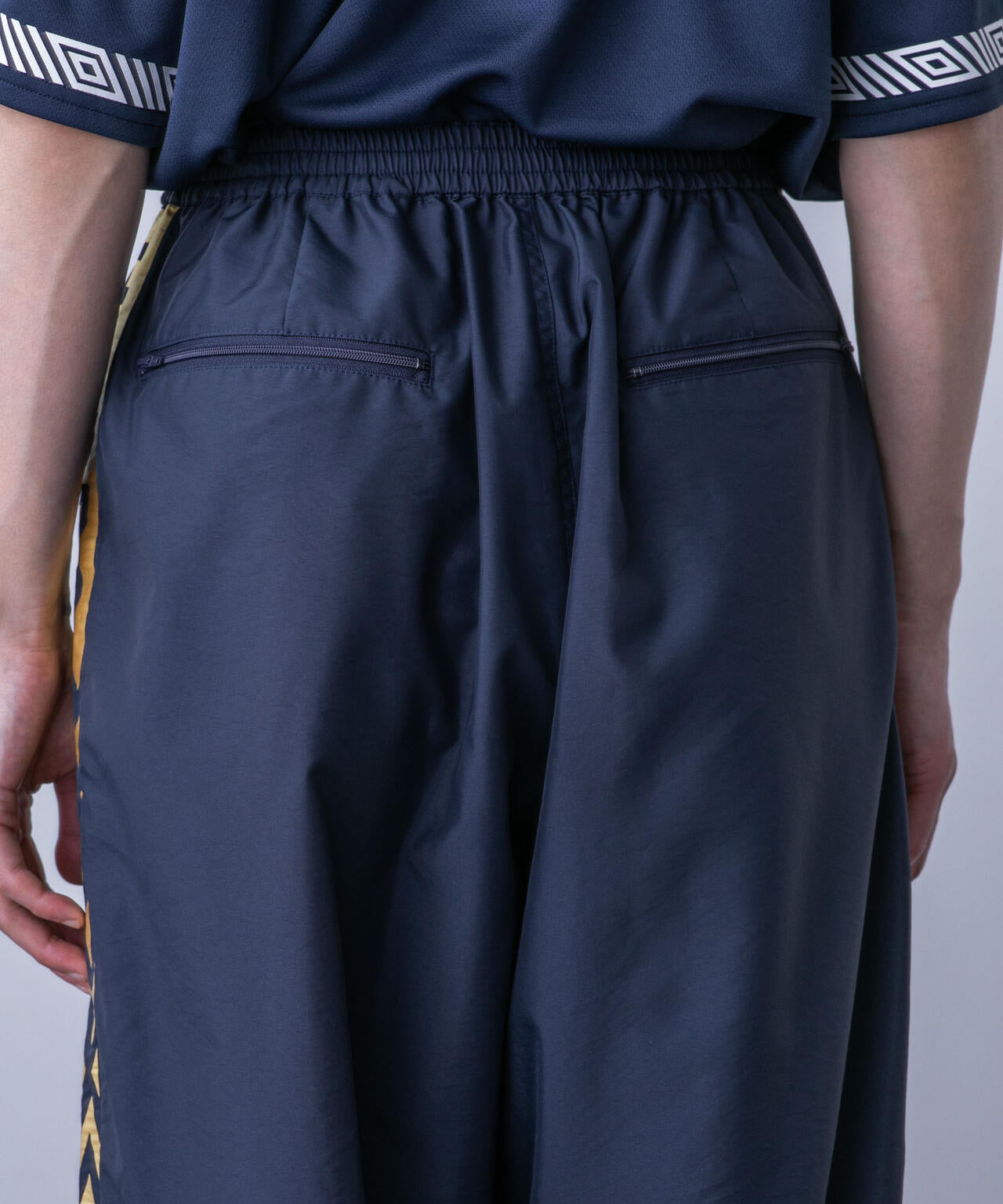 「HOTEL PALACE(オテルパラス)」UMBROトラックパンツ 6684127215