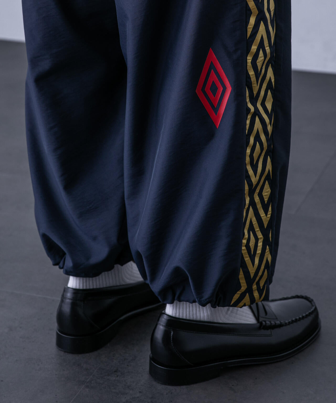 「HOTEL PALACE(オテルパラス)」UMBROトラックパンツ 6684127215