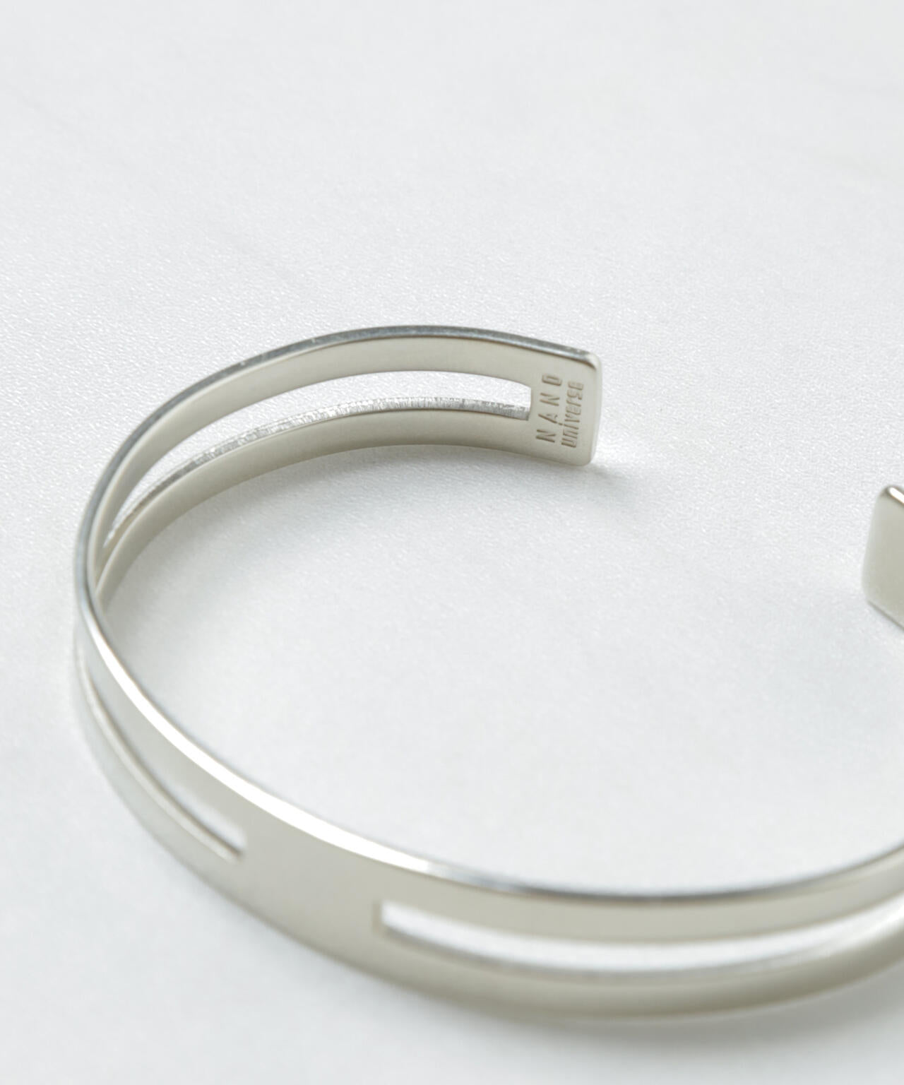 「NU jewelry」ジャーマンシルバースルーバングル 6684248203