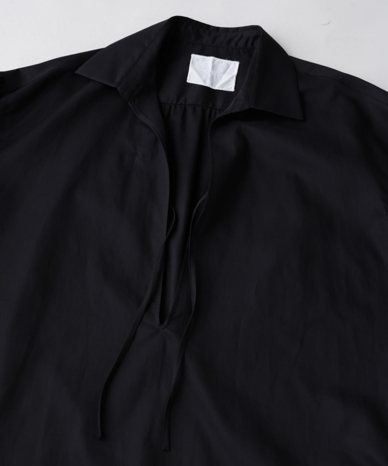 「ASSEMBLANC」ダブルクロススキッパーシャツ 6685120231