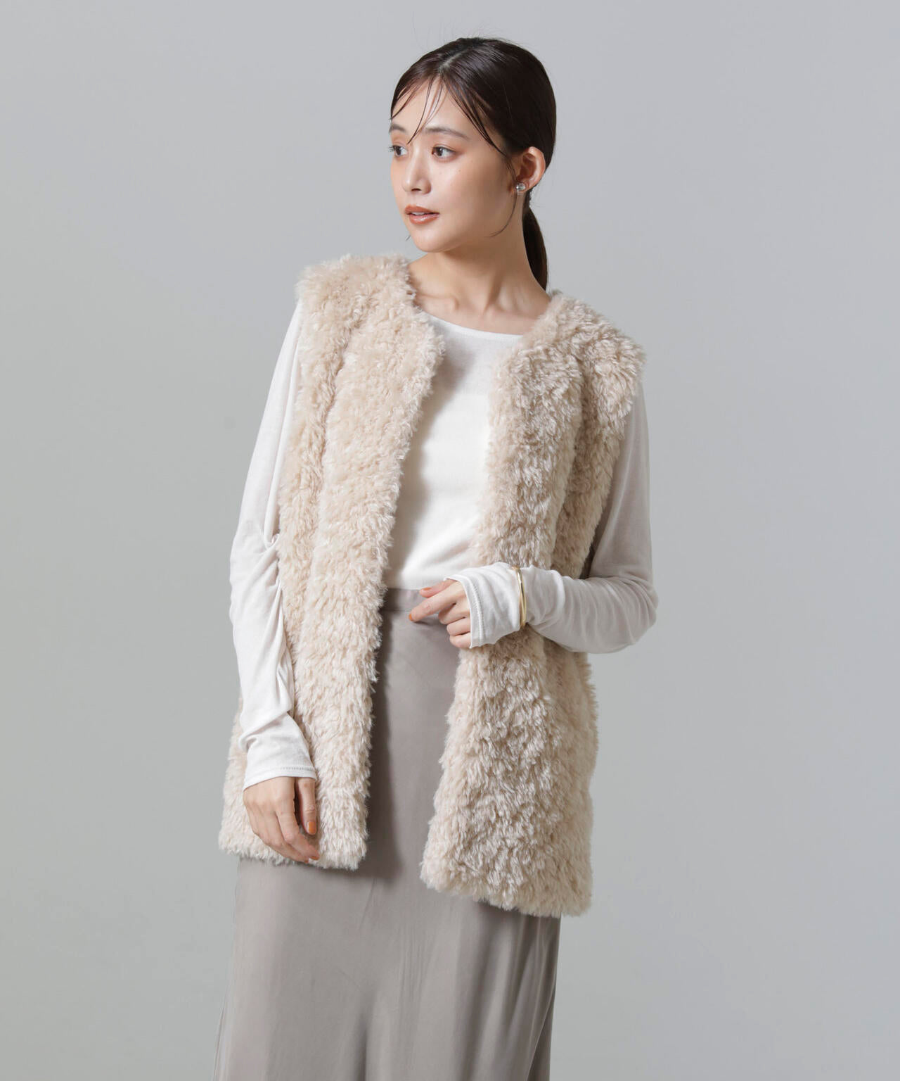 カーリーファーミドルベスト 6694216304