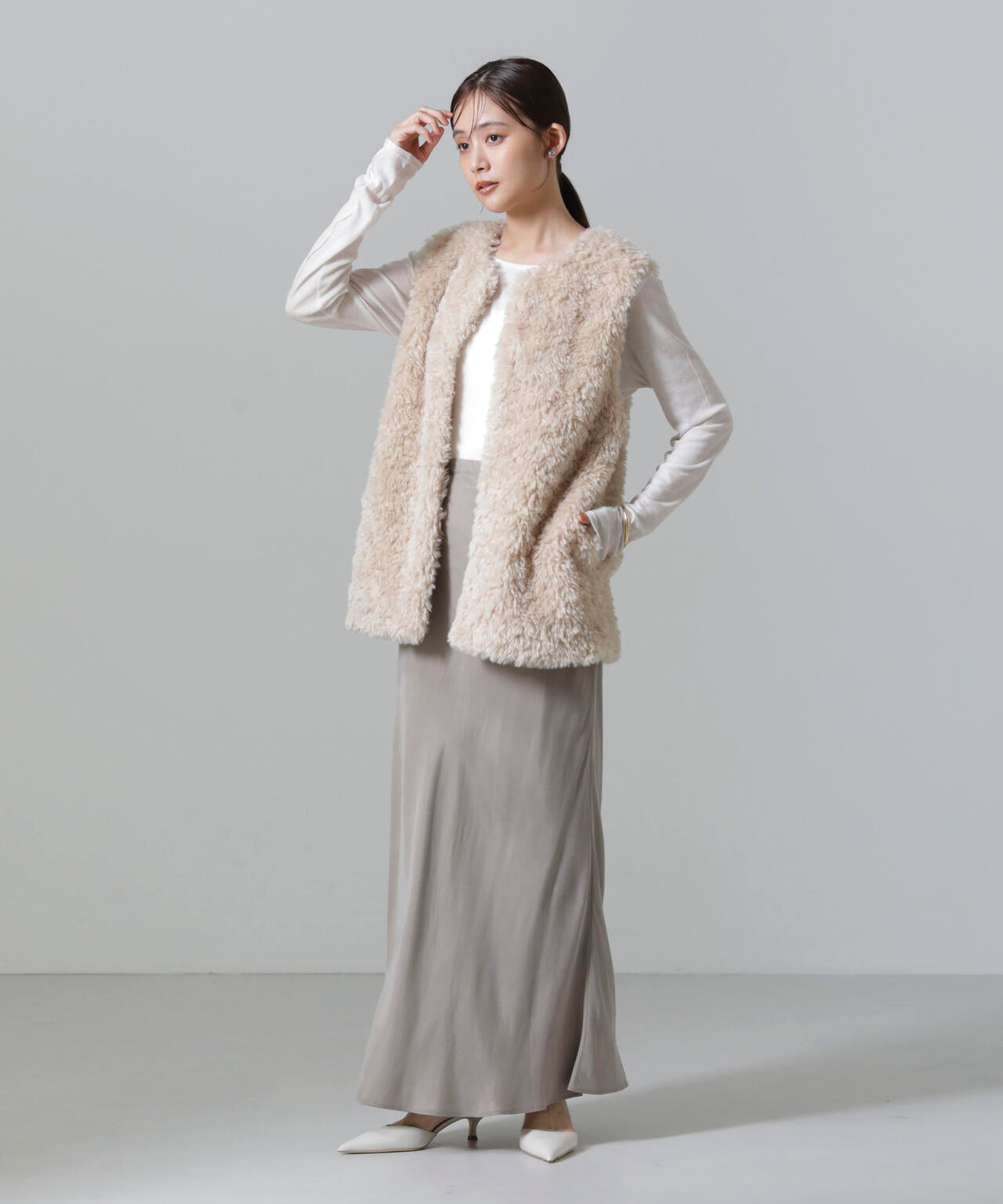 カーリーファーミドルベスト 6694216304