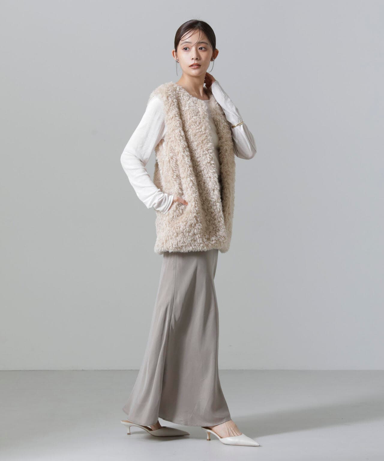 カーリーファーミドルベスト 6694216304