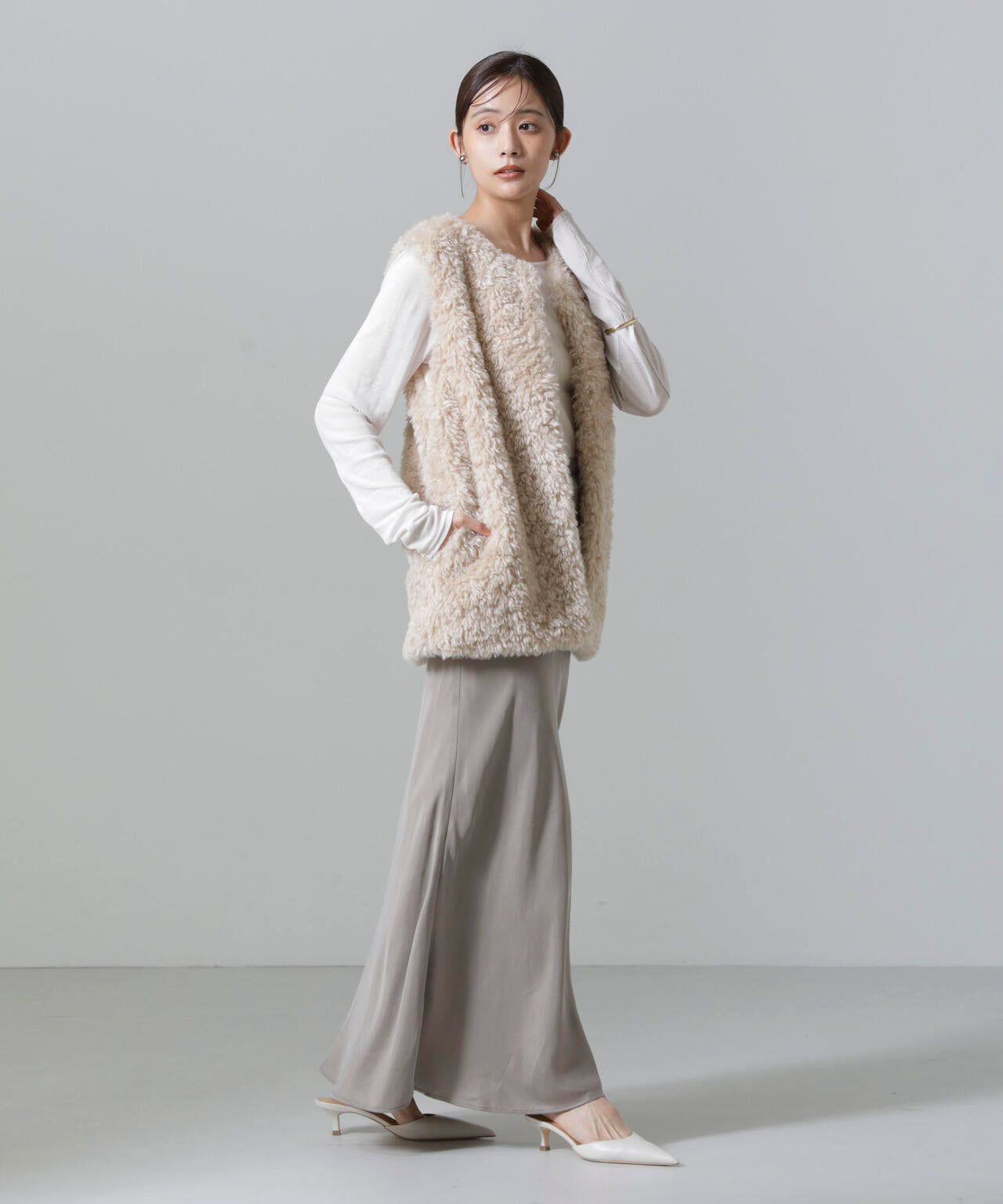 カーリーファーミドルベスト 6694216304