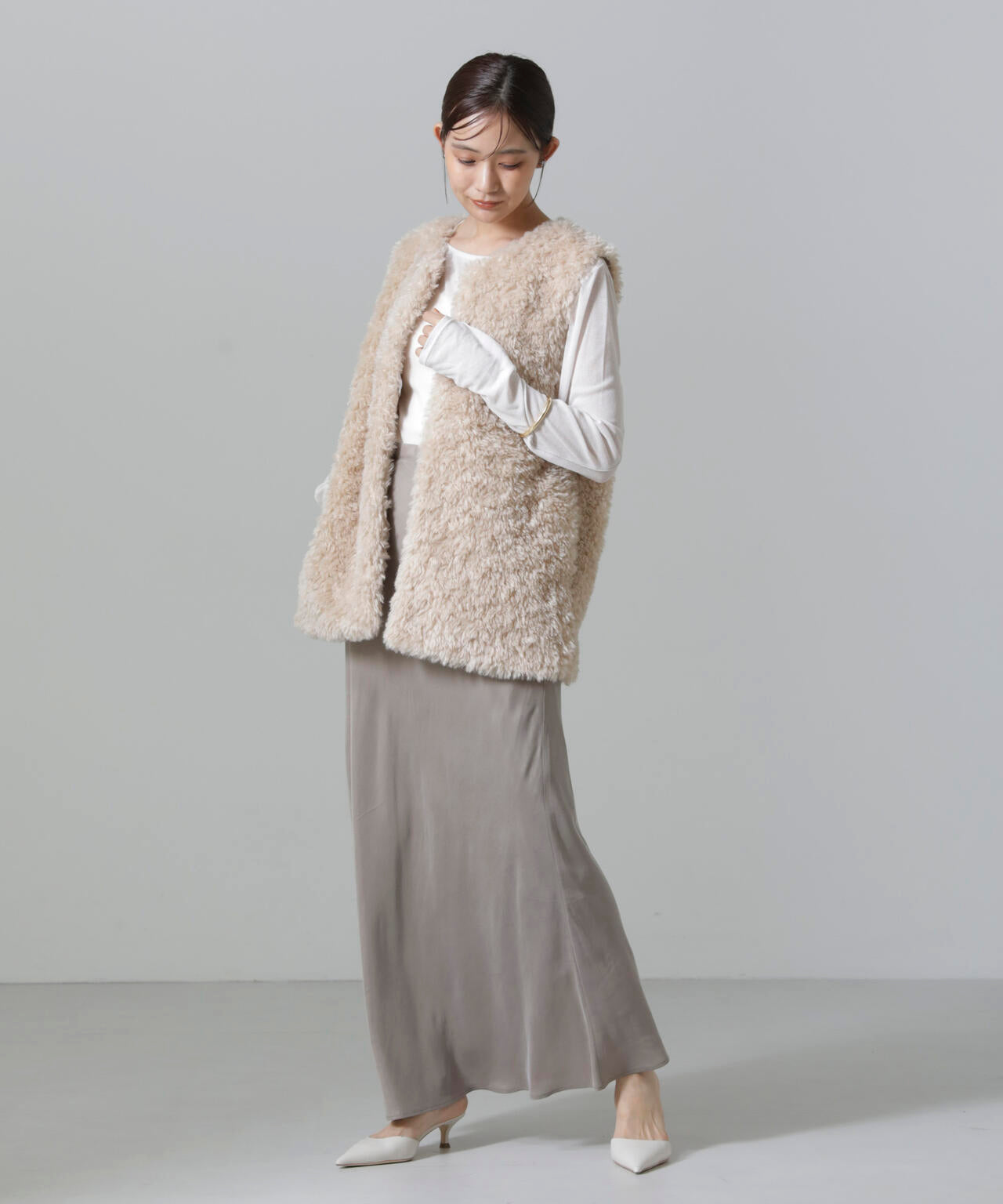 カーリーファーミドルベスト 6694216304