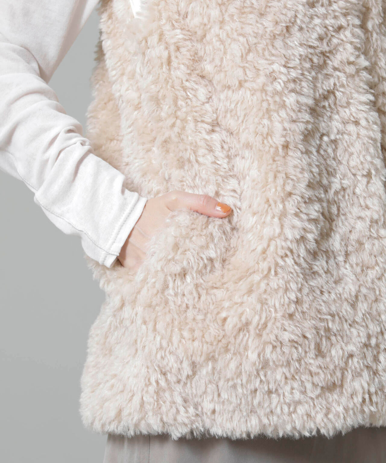 カーリーファーミドルベスト 6694216304