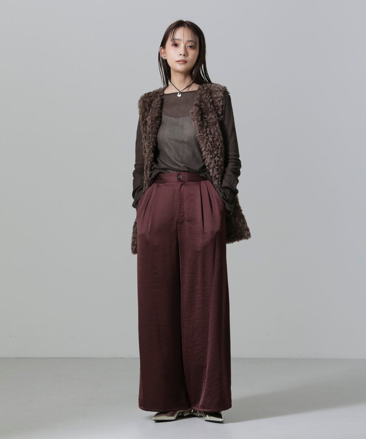 カーリーファーミドルベスト 6694216304