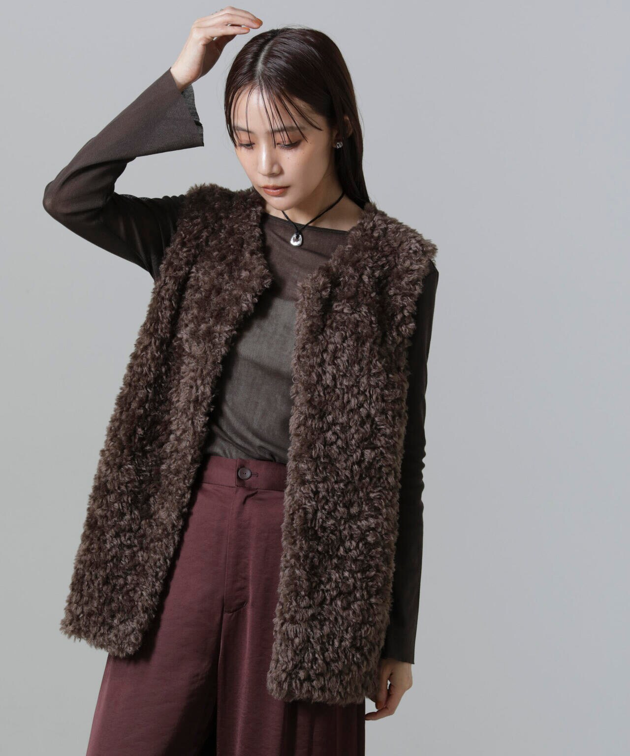 カーリーファーミドルベスト 6694216304