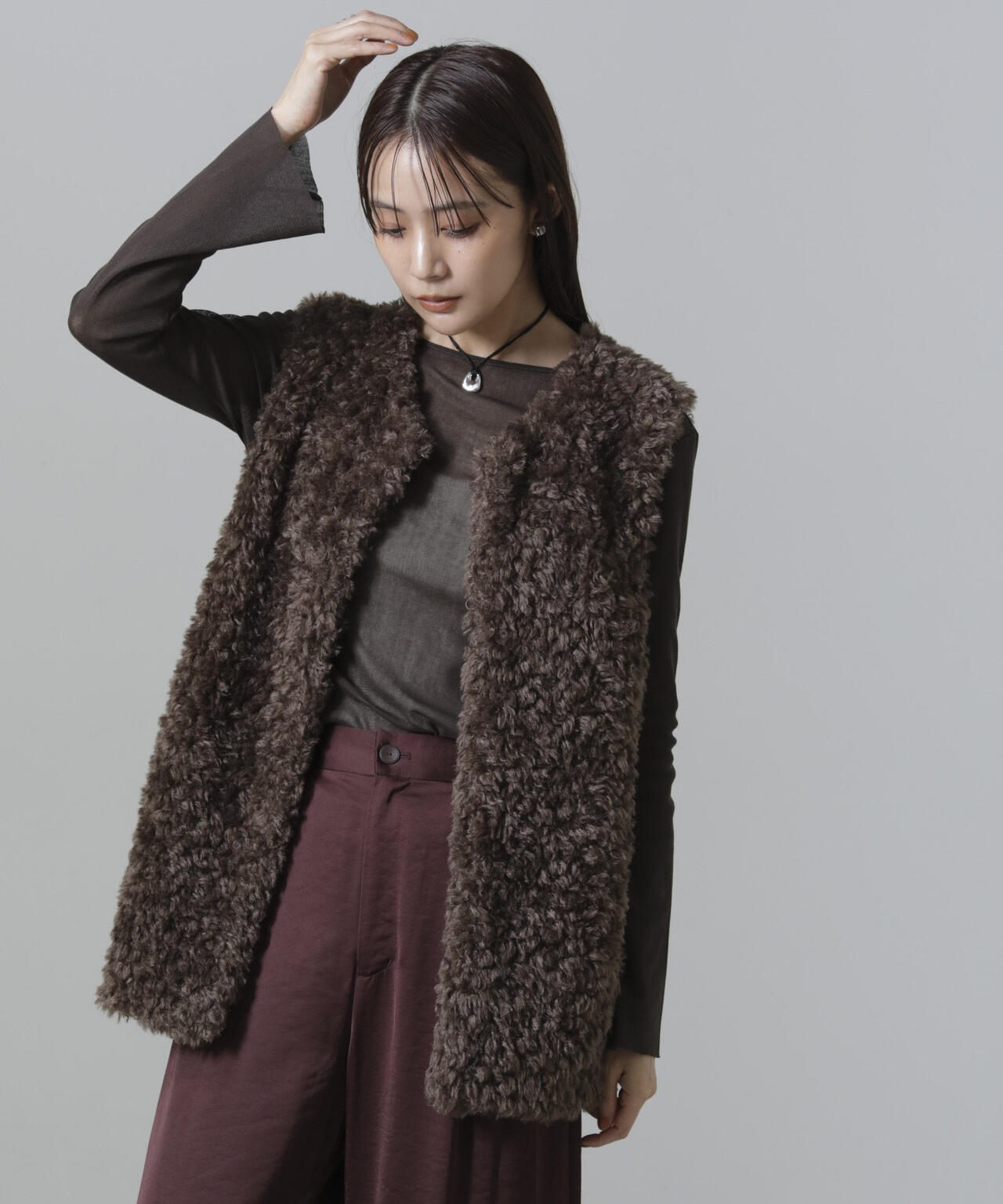 カーリーファーミドルベスト 6694216304