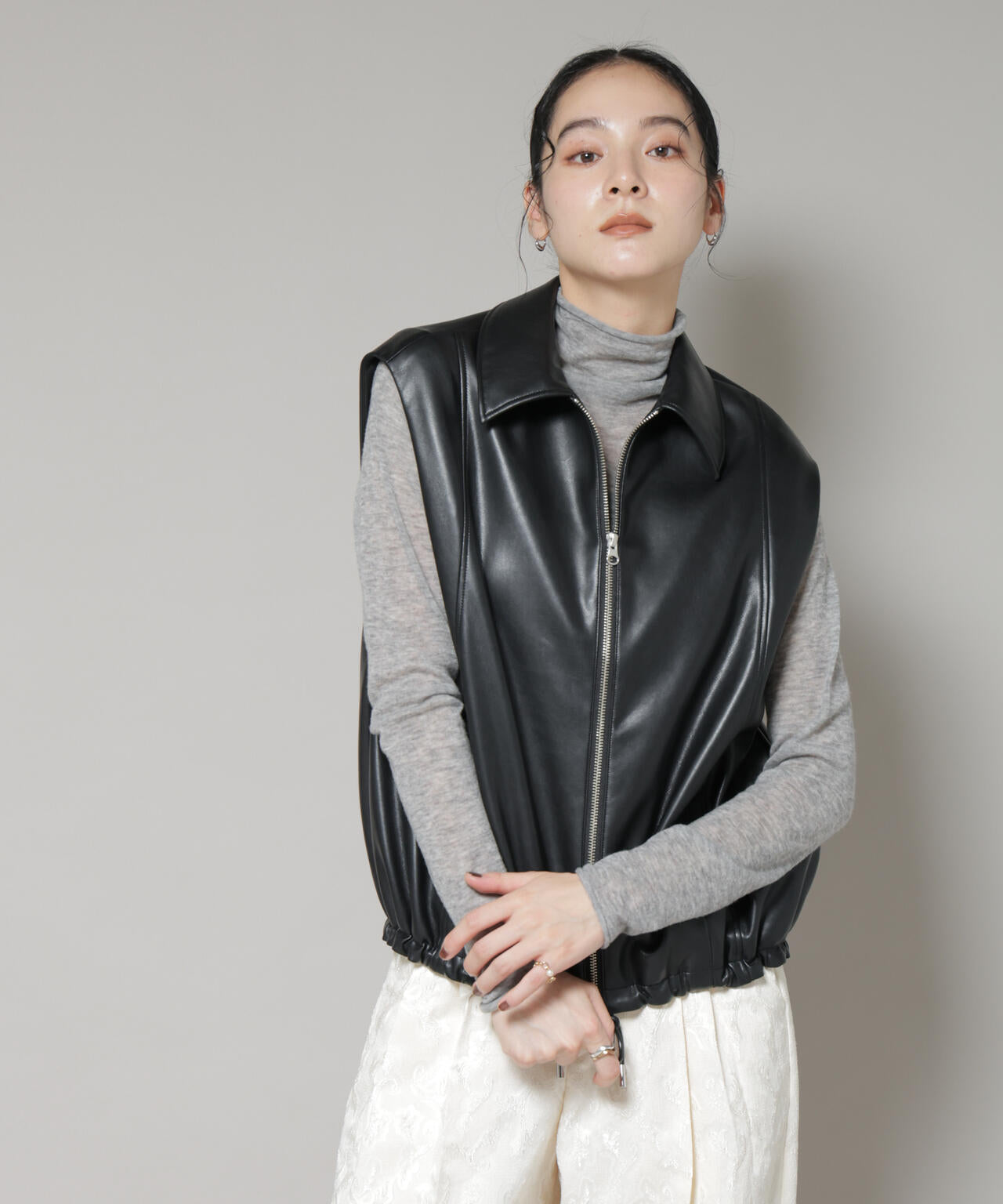 フェイクレザードロストヘムベスト 6695216312