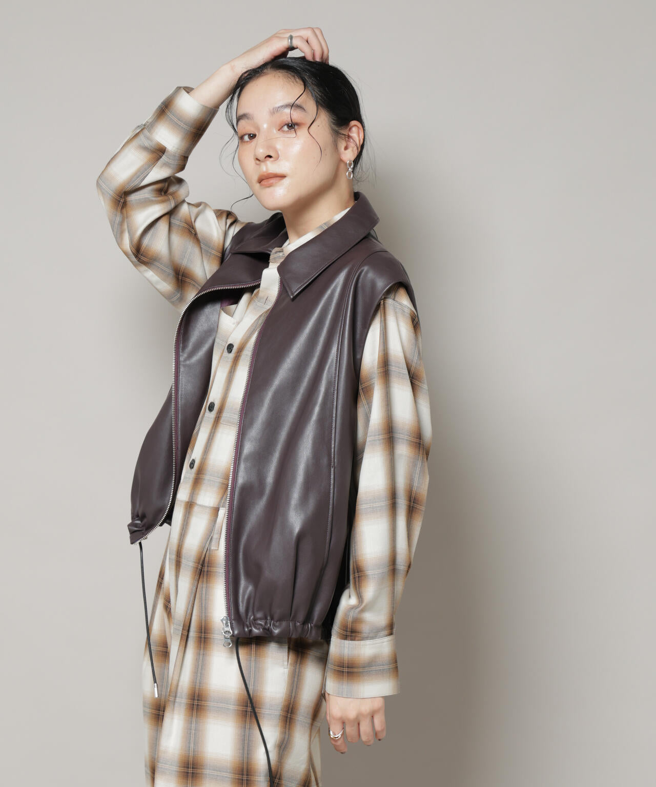 フェイクレザードロストヘムベスト 6695216312