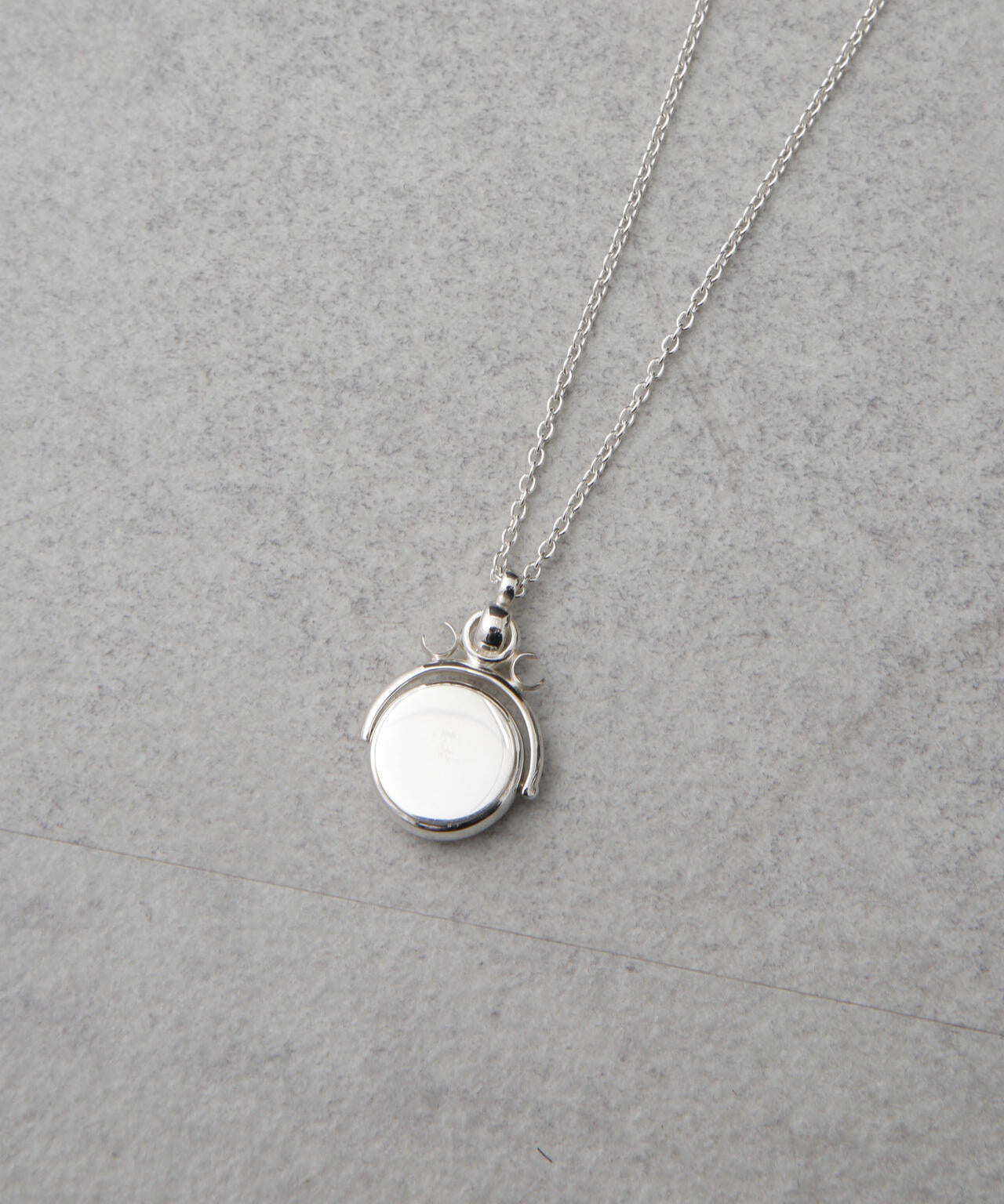 on the sunny side of the street/Rotating Fob Seal Necklace 6704246002