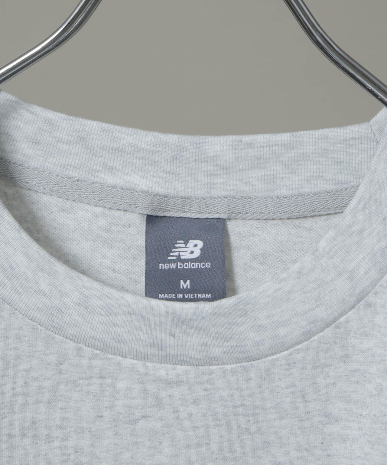 new balance/574広告Tシャツ 6706124012