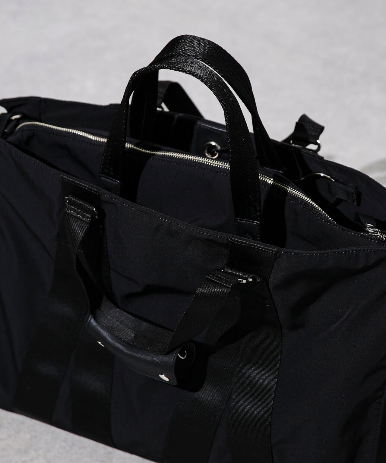 ESSENTIAL LINE」ガーメントドラムバッグ