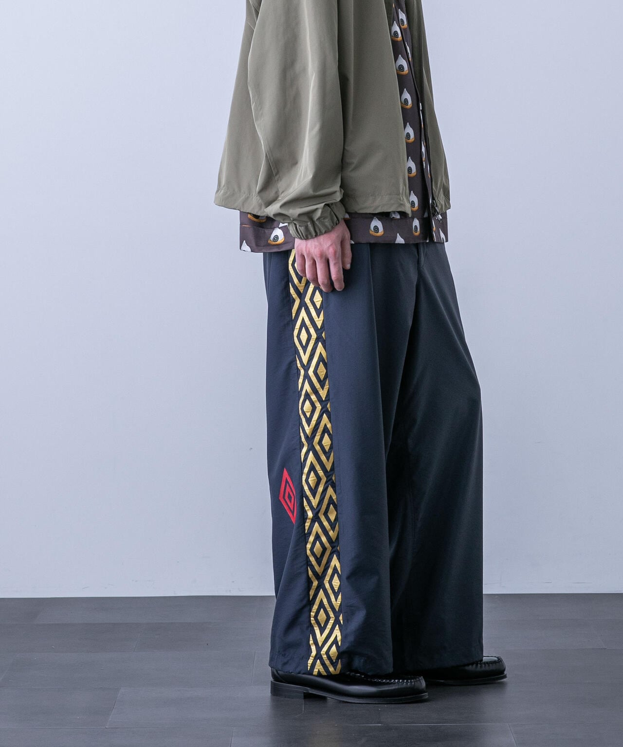 「HOTEL PALACE（オテルパラス）」UMBROトラックパンツ 6684127215