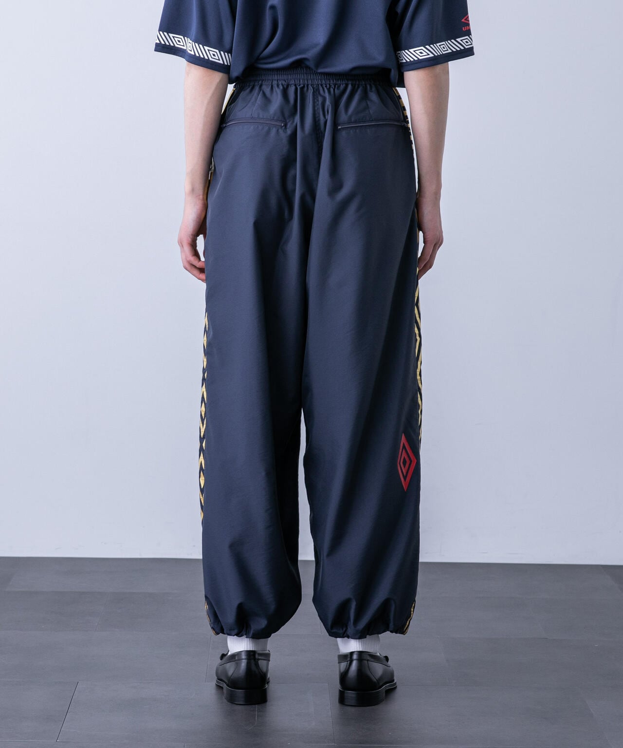 「HOTEL PALACE（オテルパラス）」UMBROトラックパンツ 6684127215