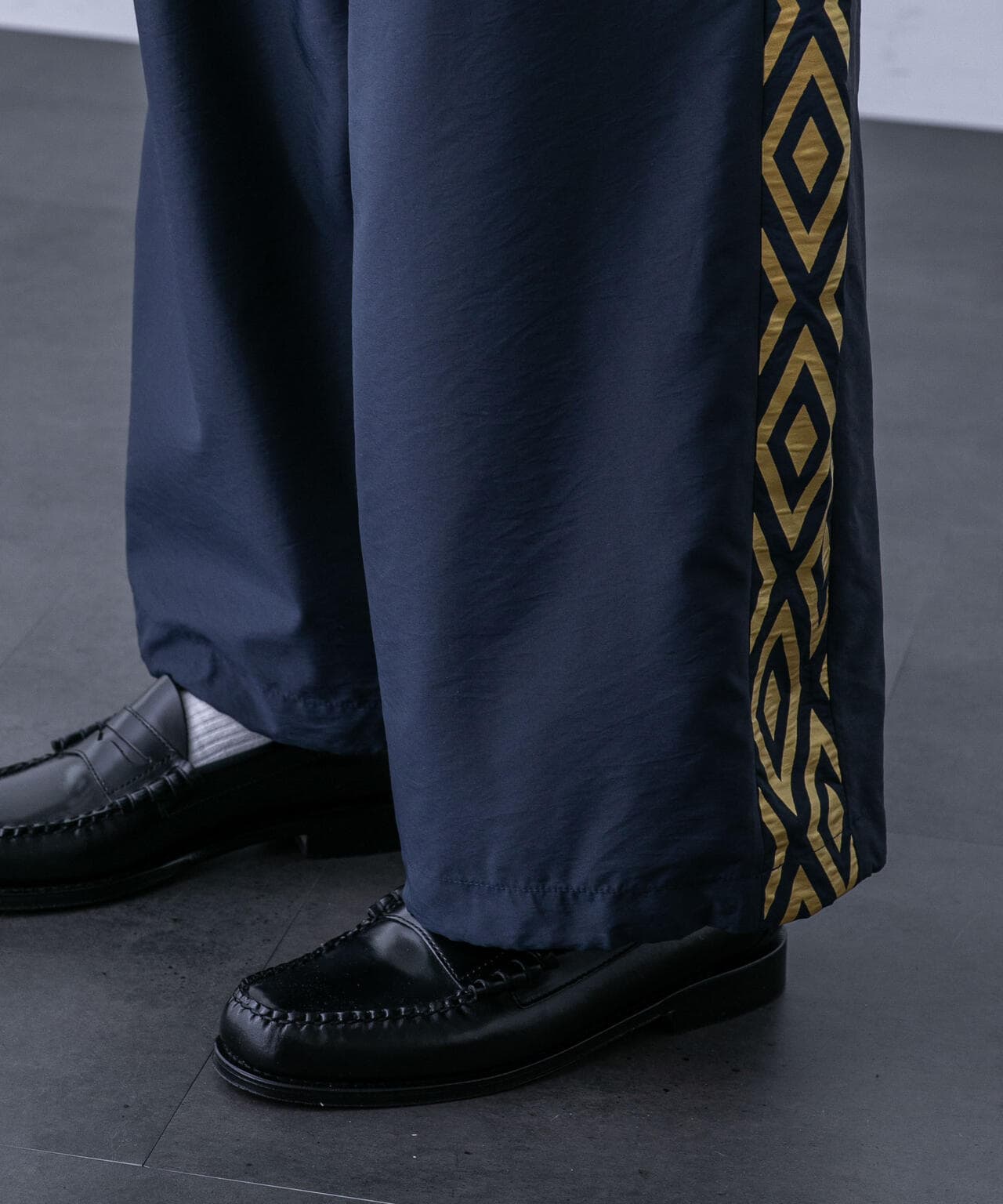 「HOTEL PALACE（オテルパラス）」UMBROトラックパンツ 6684127215