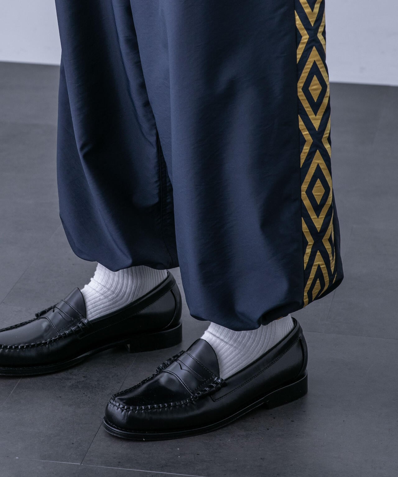 「HOTEL PALACE（オテルパラス）」UMBROトラックパンツ 6684127215