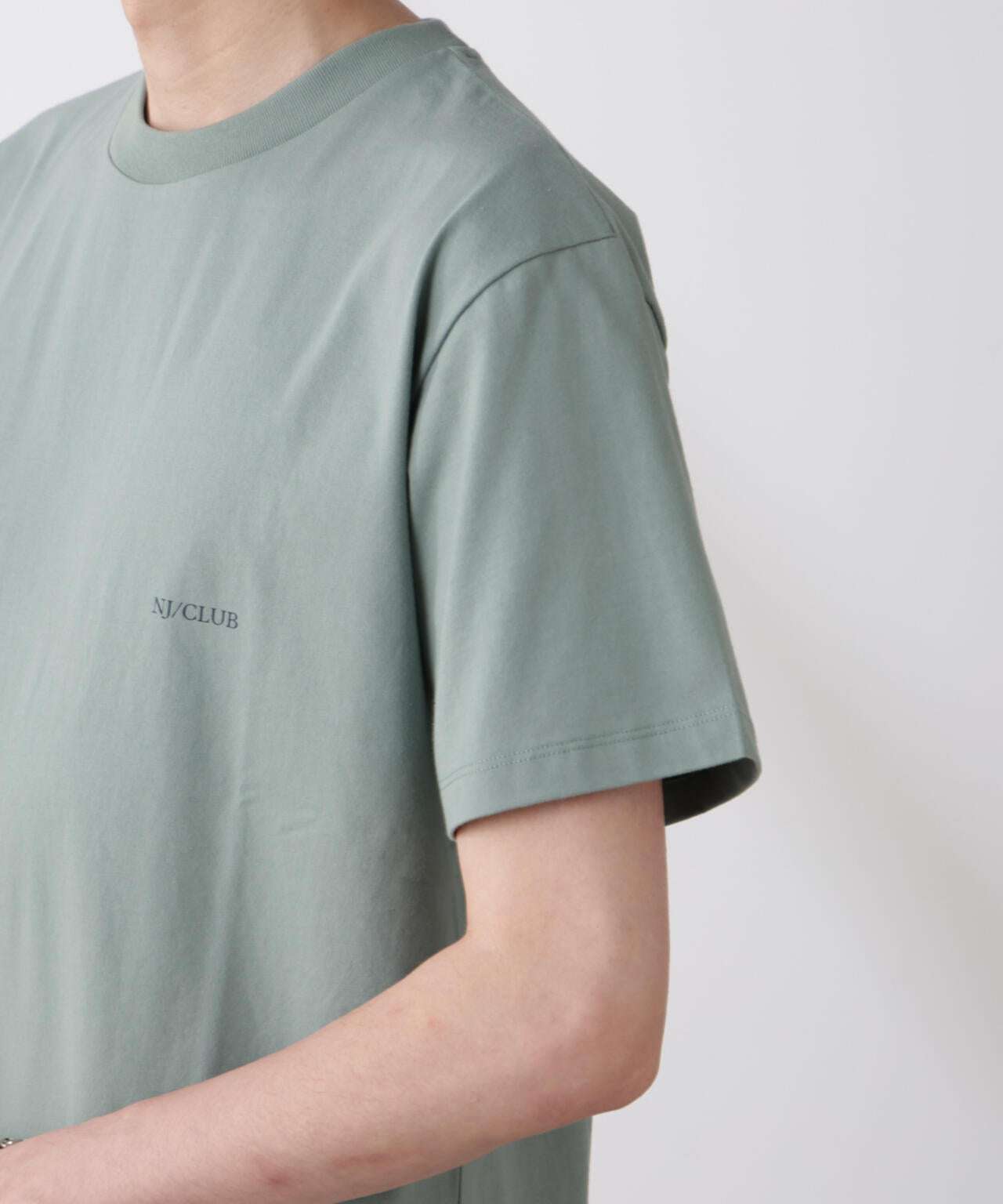NJ/CLUB」 ISLANDCLUB プリント Tシャツ