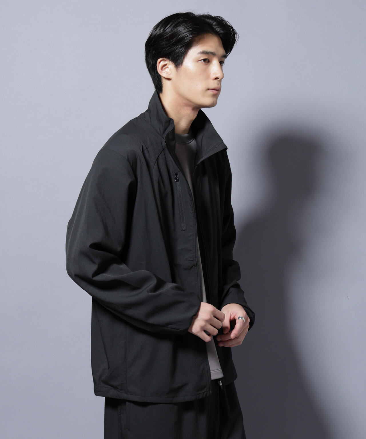 NJ/CLUB」ワンポイントロゴトラックジャケット