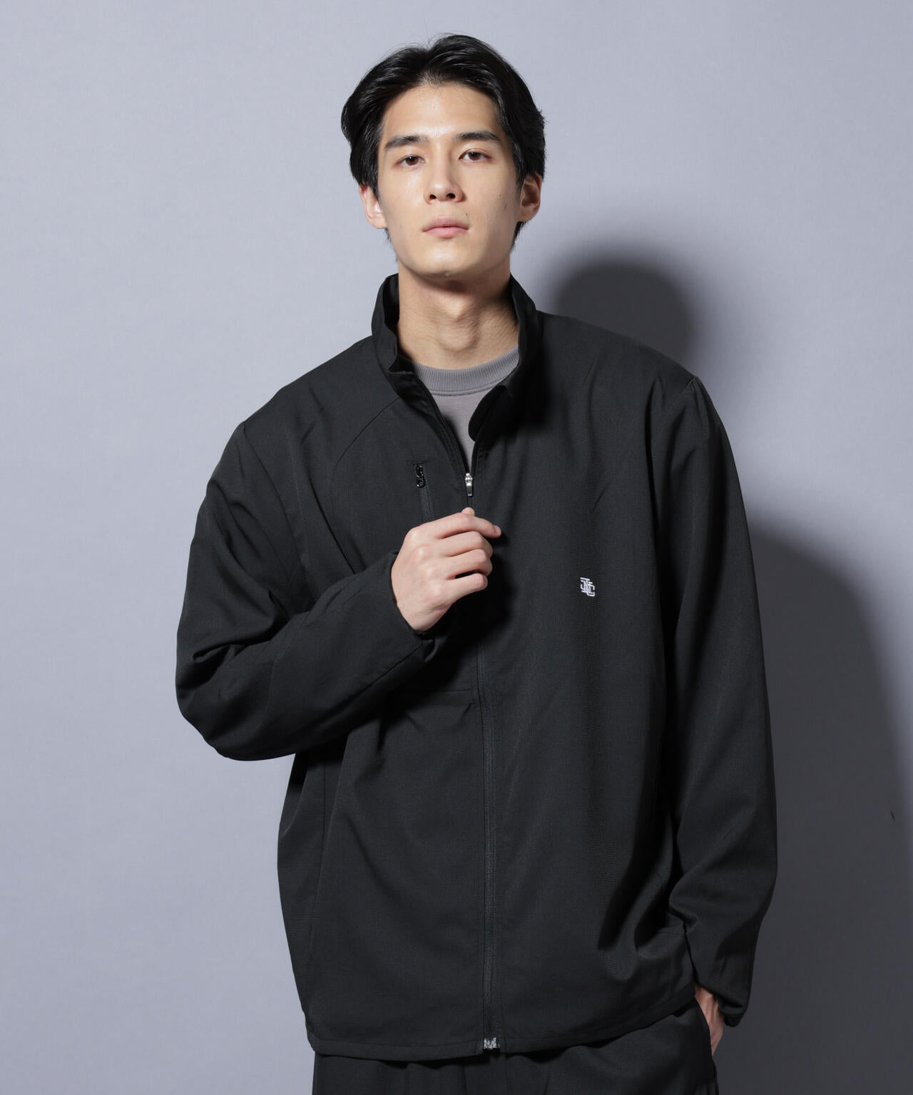 「NJ/CLUB」ワンポイントロゴトラックジャケット