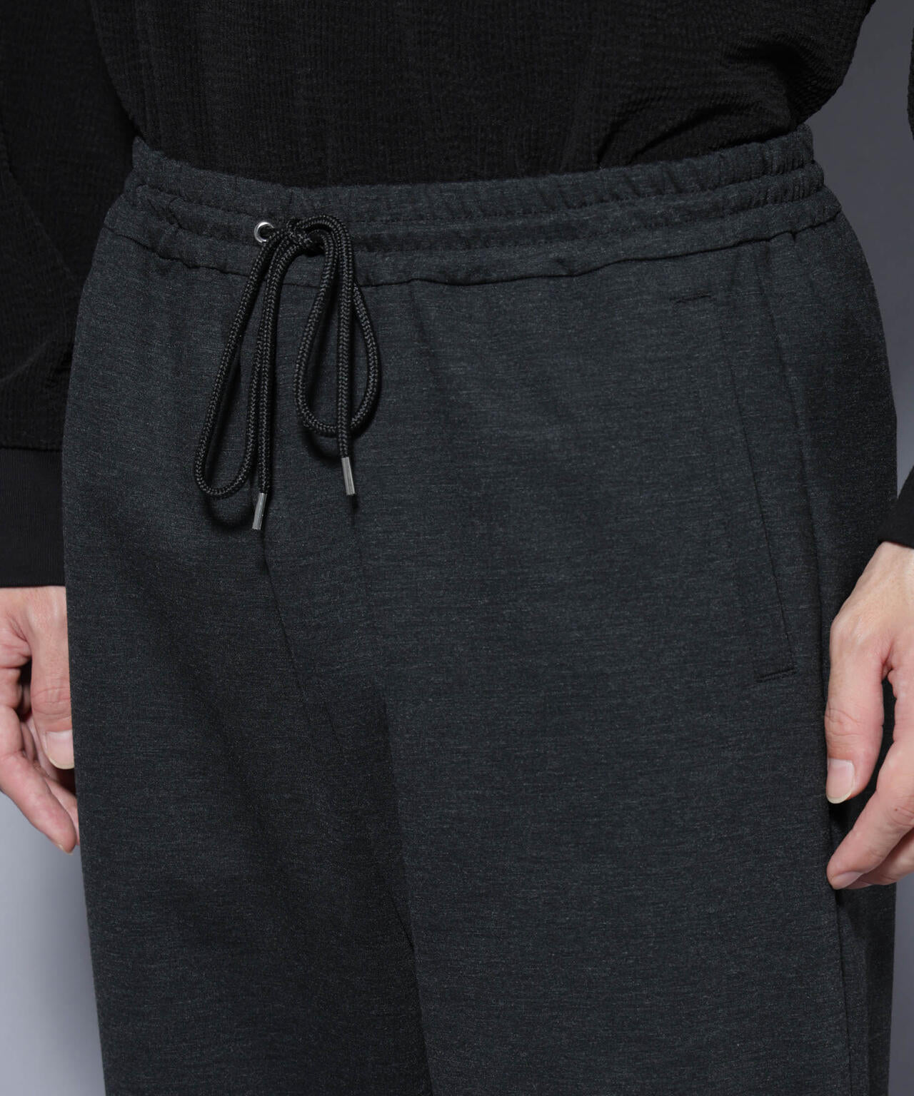 DELEGANTE TECH+ トラックパンツ