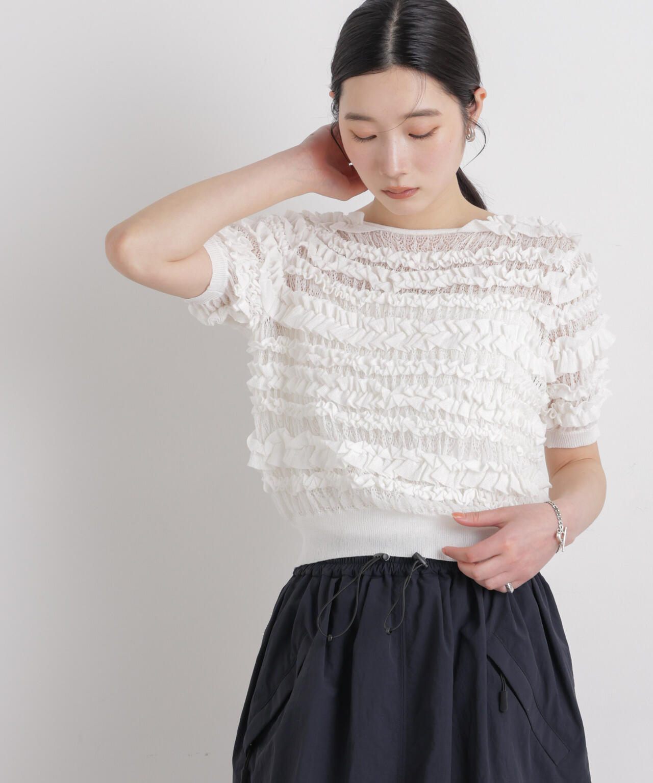 フリルシャーリングコンパクトニット 6696122316