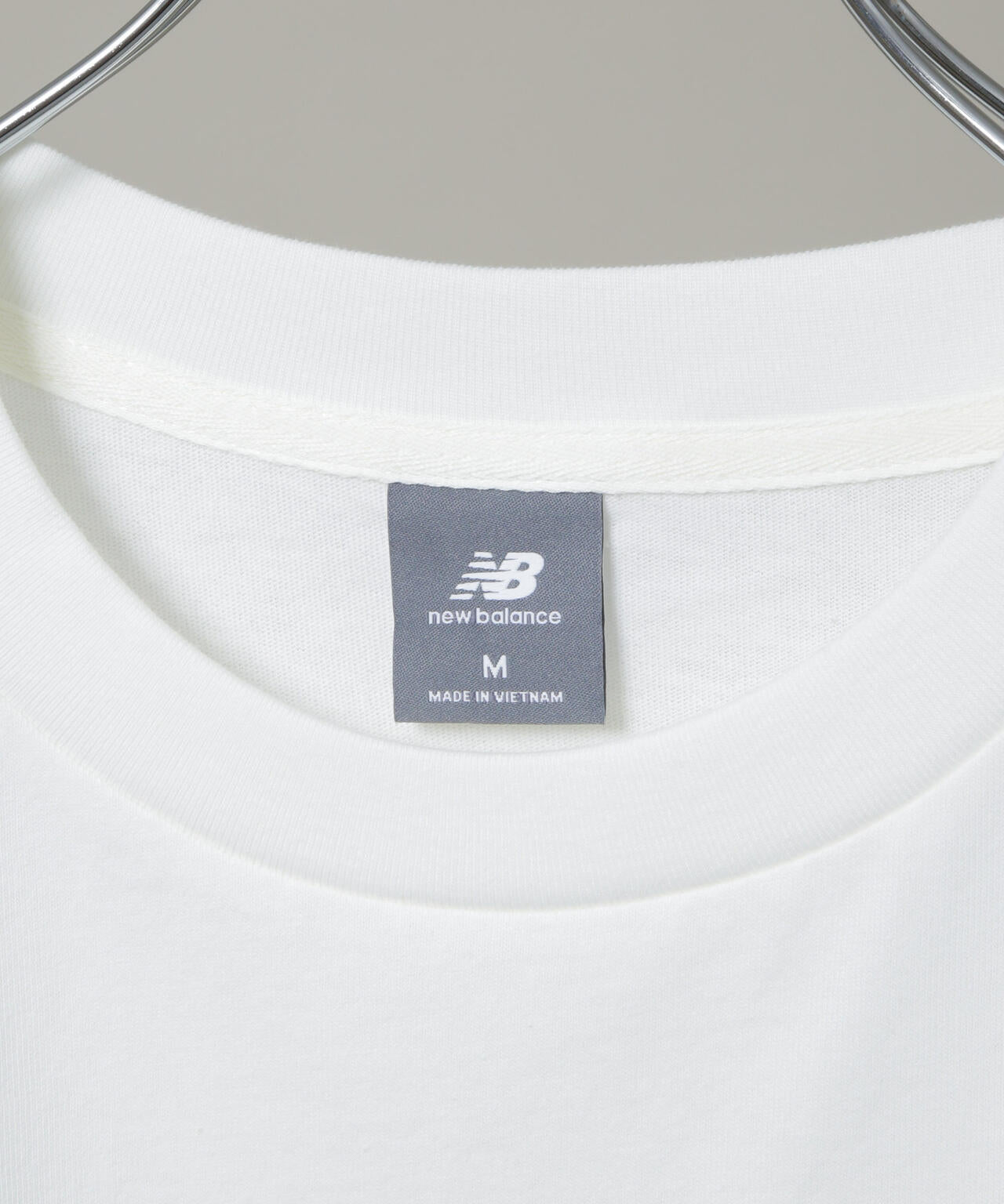 new balance/NコラージュTシャツ 6706124010