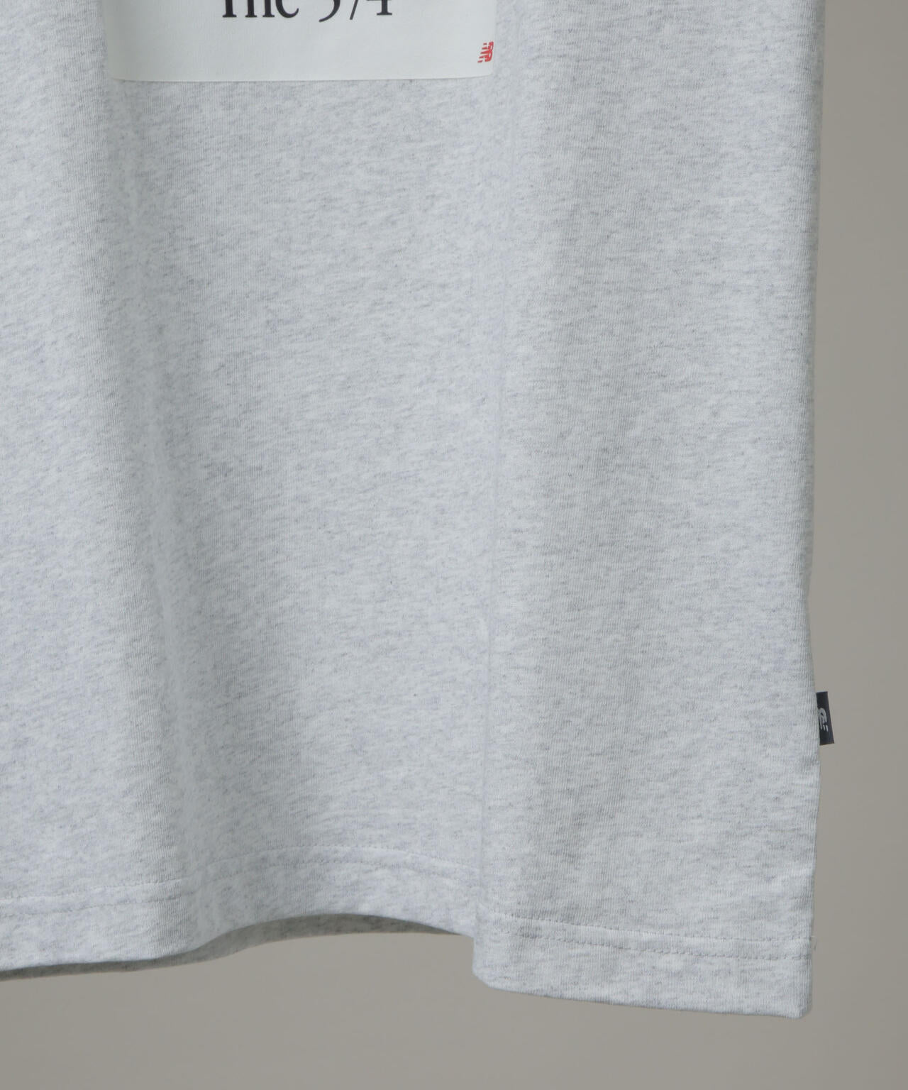 new balance/574広告Tシャツ 6706124012