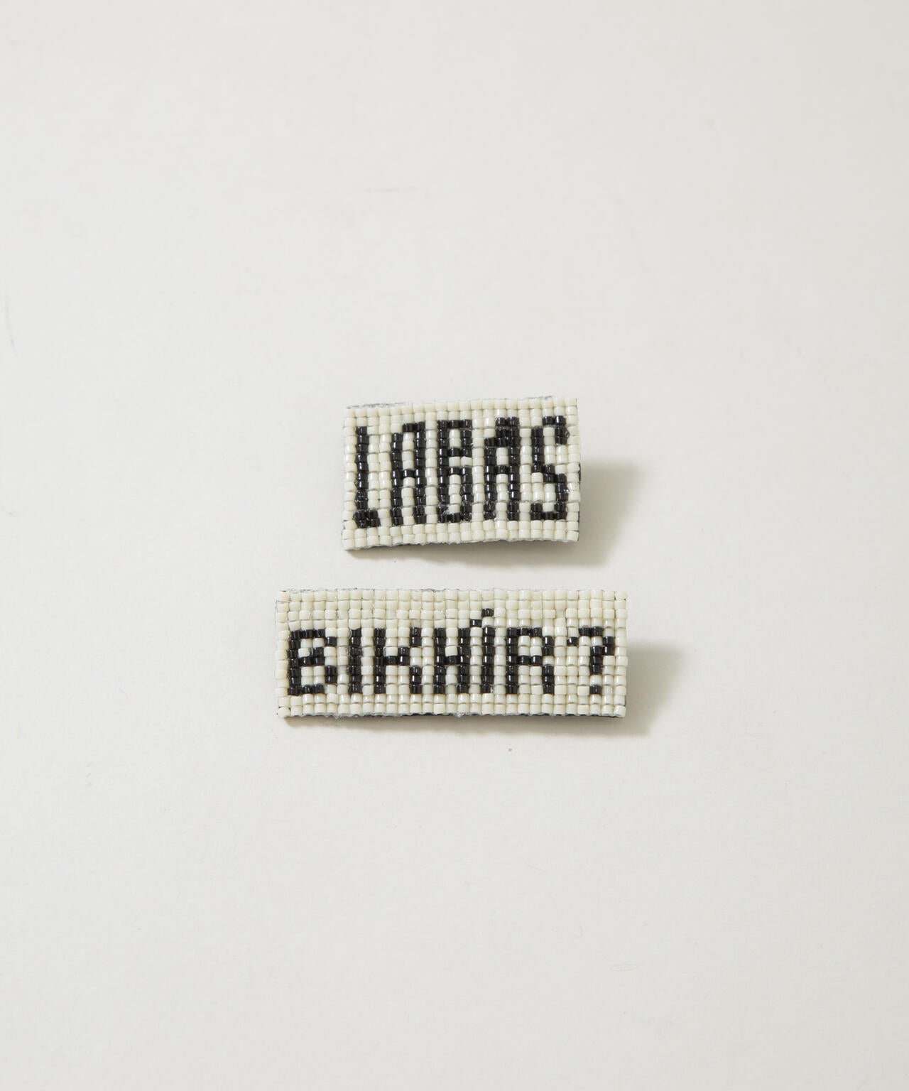 LY/Salam brooch