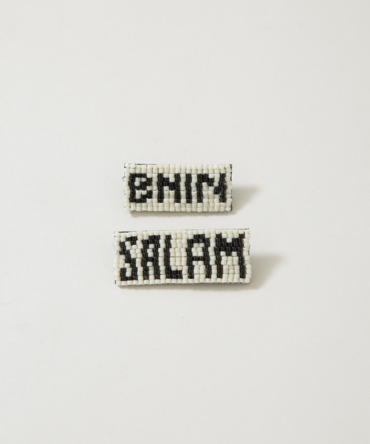 LY/Salam brooch