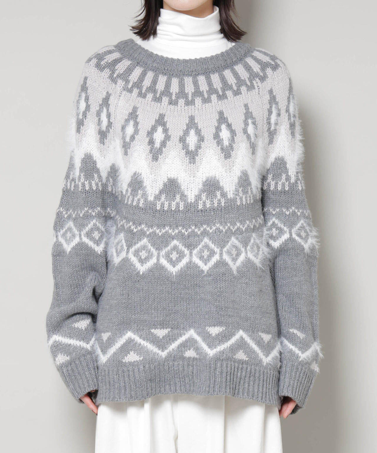 シャギーミックス求心柄ニットトップス 6735222350