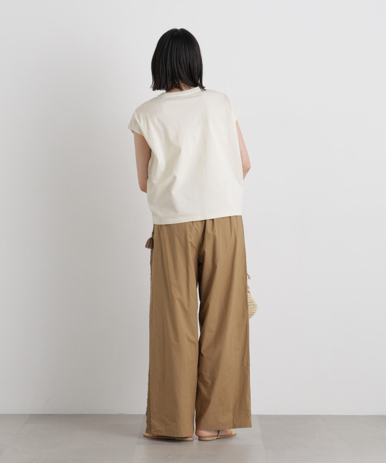 フロントシャーリングデザインカットトップス 6736124330