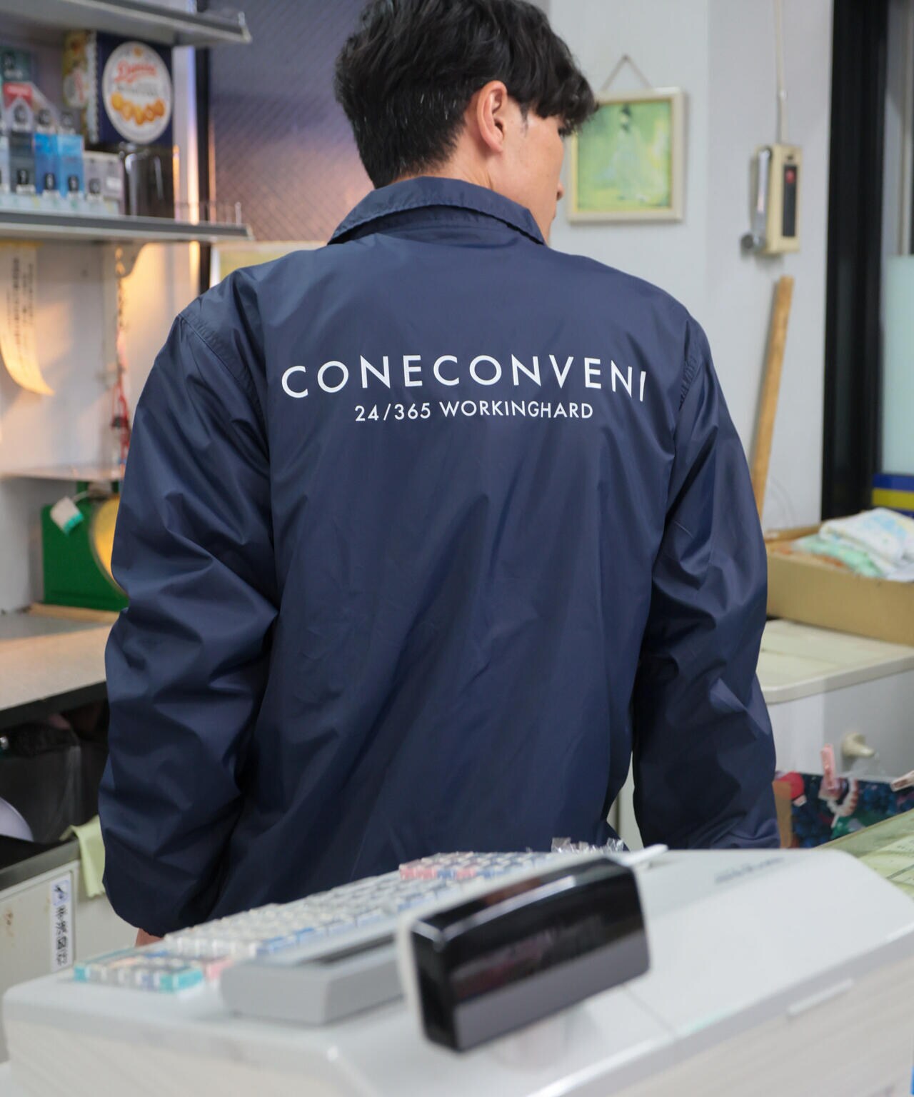 こねこフィルム xナノユニバースコラボ「CONECONVENI」コーチジャケット 6754212300
